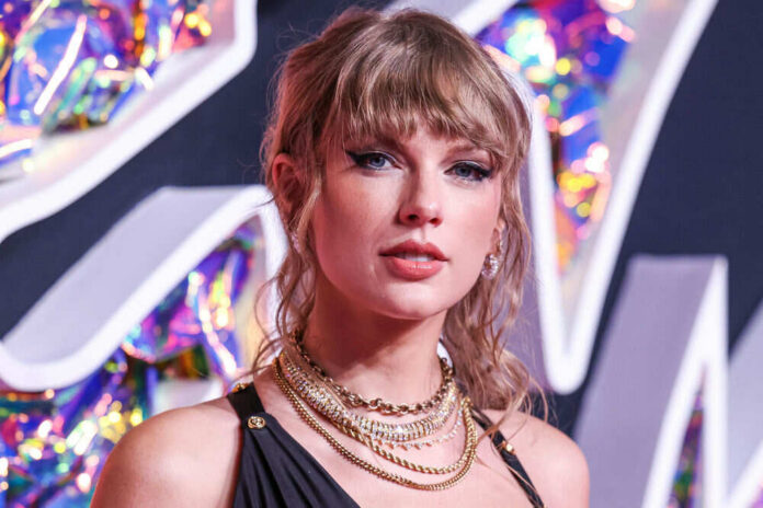 Woman with bangs wearing layered necklaces, colorful background.