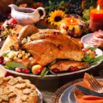 Roast turkey with stuffing on a festive autumn table