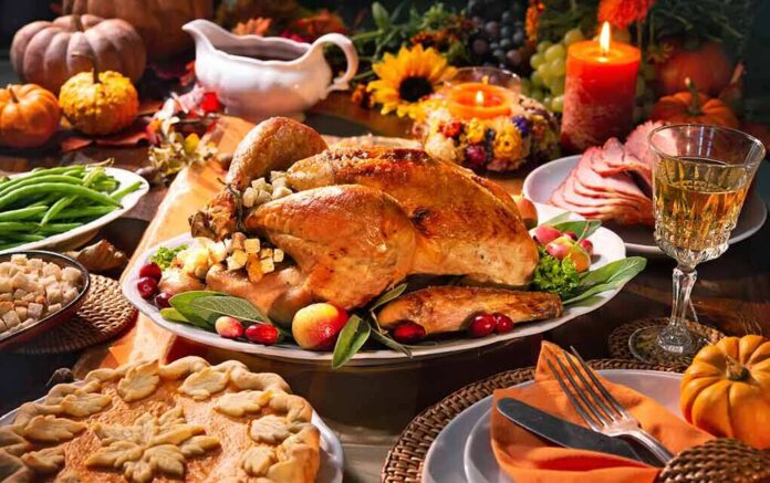 Roast turkey with stuffing on a festive autumn table