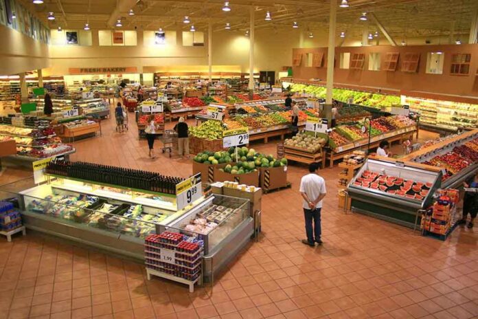 shutterstock_15941416-3 Interior of a grocery store filled with fresh produce and shoppers