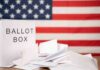 Ninth Circuit Carves Up Arizona Voting Laws Ballot box with papers in front of an American flag