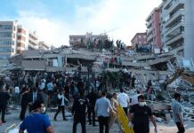 Ballistic Barrage Turns Cities Into Targets Rescue workers and civilians on collapsed building after earthquake