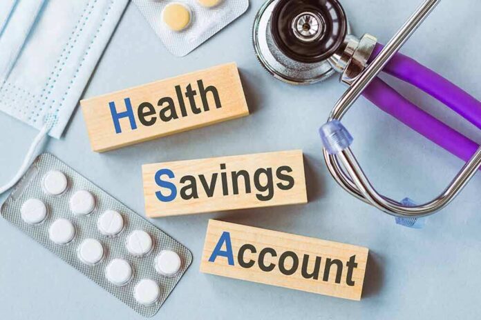 shutterstock_1931606714-1 Health savings account blocks with stethoscope and pills
