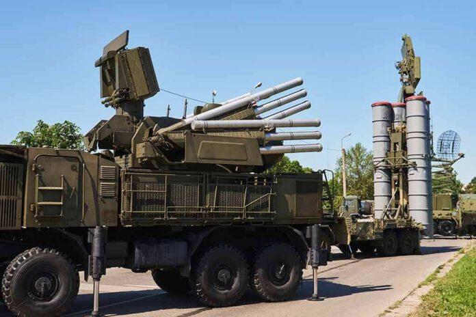 military air defense vehicles on a road