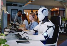 Robot and office workers at computers in a modern workspace
