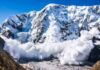 Avalanche Trap Turns Deadly Below Castle Peak Snow avalanche sweeping down a rugged mountain