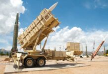 America’s Missiles VANISH — Now What? Patriot missile defense system on display outdoors with various missiles in the background