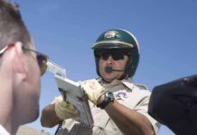 46,000 NYC Tickets Dismissed Before Hearings Police officer issues a traffic ticket to a driver