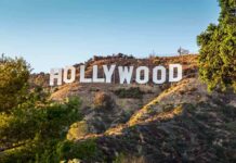 Celebrity Couple Confirms Split With United Message Hollywood Sign on a sunlit hillside