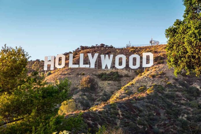 shutterstock_114467512-7 Hollywood Sign on a sunlit hillside
