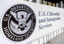 DHS Faces Pressure To Deliver Mass Deportations USCIS building exterior sign with DHS seal