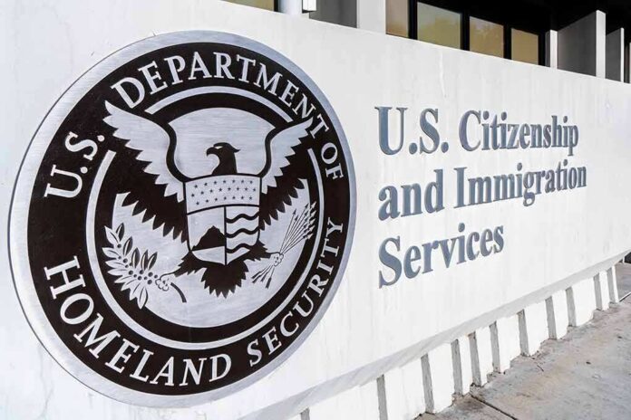 USCIS building exterior sign with DHS seal