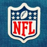 NFL logo patch on a blue background