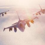 U.S. Rejects Saudi Strikes on Houthis Three fighter jets flying in formation above clouds at sunrise