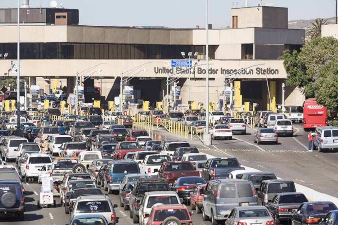 shutterstock_606439271-1 Border inspection station with heavy vehicle traffic