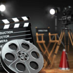 Affleck’s Quiet AI Play Shakes Hollywood Movie set with film reels and clapperboard.