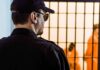 Parole Twist In Amber Guyger Case Security guard watching inmates behind jail bars