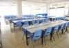 Cornell’s New Review Goes Beyond One Case Empty cafeteria with rows of blue chairs and long tables
