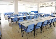 Cornell’s New Review Goes Beyond One Case Empty cafeteria with rows of blue chairs and long tables