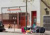 Demetrius McCray outside Tenderloin Housing Clinic with belongings on sidewalk