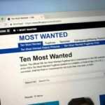 DOJ Drops Hammer On Ex-FBI Officials Computer screen showing an FBI Most Wanted webpage