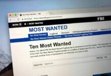 Computer screen showing an FBI Most Wanted webpage