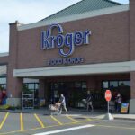 Supermarket Fireball Stuns Odesa Kroger storefront with shoppers and carts