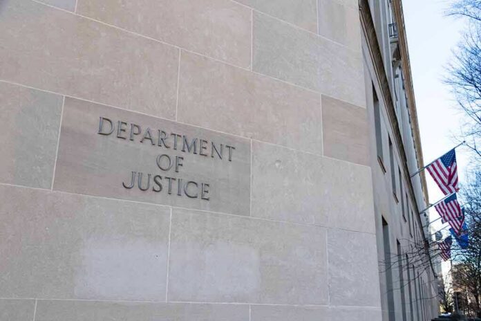 shutterstock_1605140956 Department of Justice building exterior with American flags