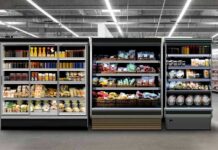 Salmonella Alert Hits Tesco, M&S Supermarket refrigerated display cases with drinks, produce, and prepared foods