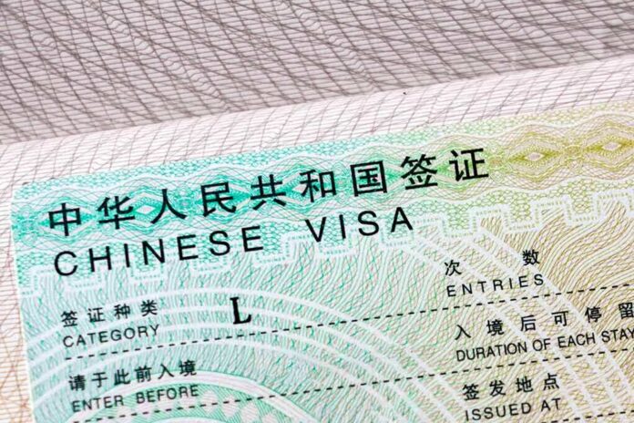 shutterstock_1730072584-1 Chinese visa document close-up