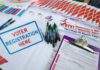 California’s Campaign Money Bombshell Voter registration table with forms, pens, and informational materials