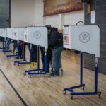 California’s Voter ID Fight Isn’t What It Seems Voters at polling booths in a gymnasium