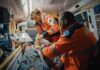 Miami Horror: Man Torched After Fight Paramedics treating a patient inside an ambulance