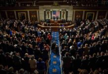 Did One Vote Prove an Epstein Cover-Up? Legislative chamber audience stands and applauds