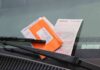 parking ticket under windshield wiper