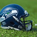 Hurts Scare Triggers Bold QB Poach American football helmet on grass