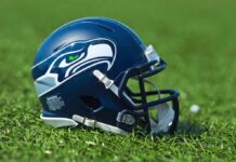 Hurts Scare Triggers Bold QB Poach American football helmet on grass
