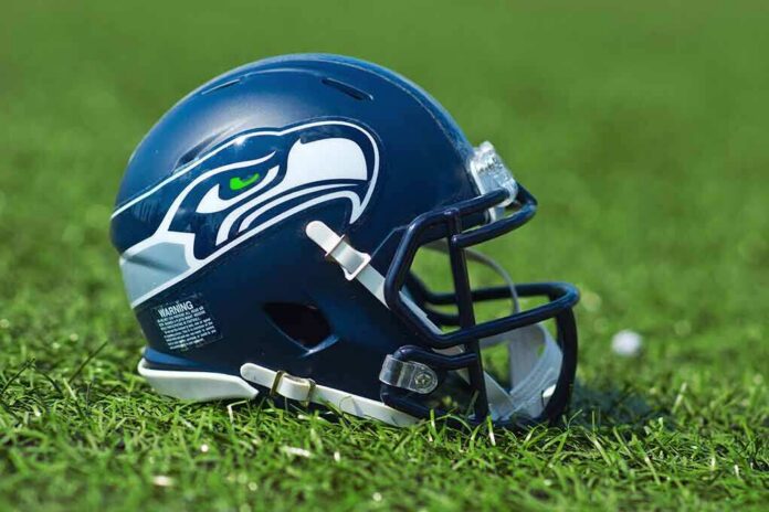 American football helmet on grass