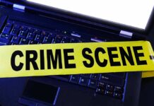 Recorded Call Flips UA Case Laptop keyboard with yellow crime scene tape across it